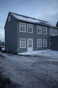 Building against sky during winter