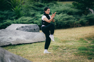 Woman standing on field