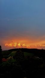 Scenic view of landscape at sunset