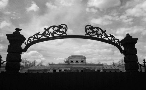 Low angle view of historic building against cloudy sky