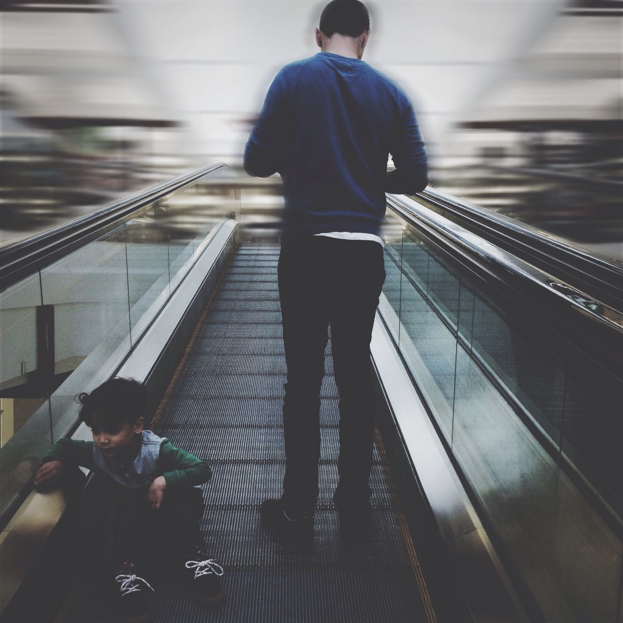 indoors, lifestyles, rear view, standing, full length, escalator, walking, steps, railing, men, casual clothing, steps and staircases, railroad station, subway, staircase, person, leisure activity, railroad station platform