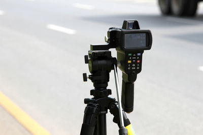 Close-up of camera on street