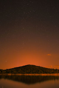 Scenic view of star field against sky at night