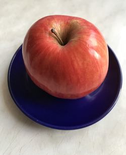 High angle view of apple in bowl on table