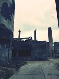 Abandoned building against sky