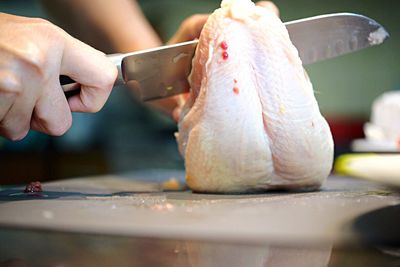 Close-up of man preparing food