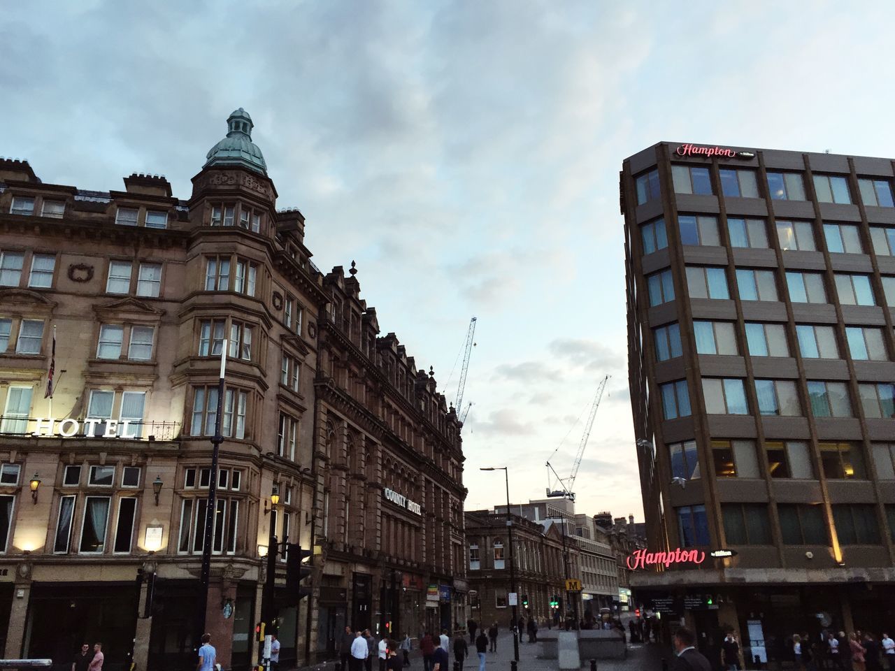 PEOPLE ON CITY STREET