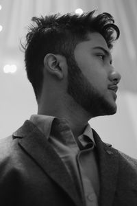 Portrait of young man looking away