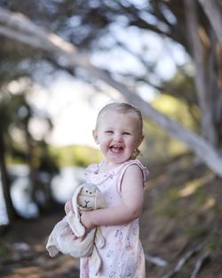 Portrait of cute baby girl outdoors