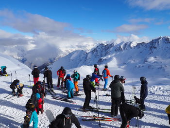 High angle view of skiers on snowcapped mountain