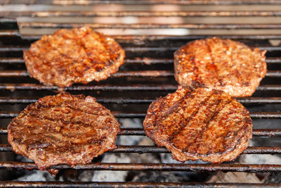 Close-up of meat on barbecue grill