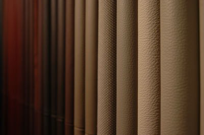 Close-up of various rolled up leather