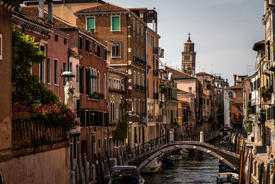 View of bridge over canal in city