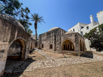 Low angle view of historic building against sky