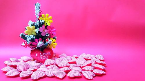 Close-up of pink flowers on table