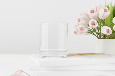 Close-up of white flower vase on table