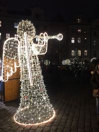 Illuminated christmas tree at night