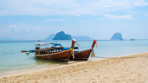 Boat in sea against sky
