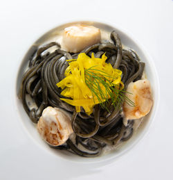 High angle view of food in bowl on white background