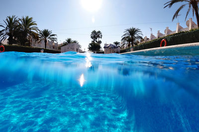 Swimming pool against blue sky