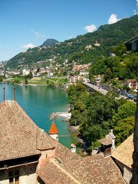 High angle view of houses and town against sky