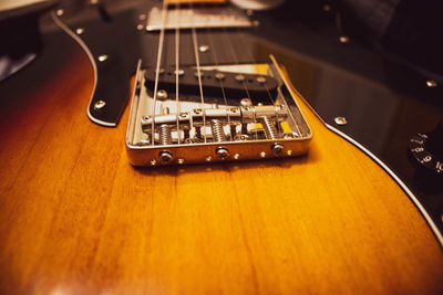 High angle view of guitar on table