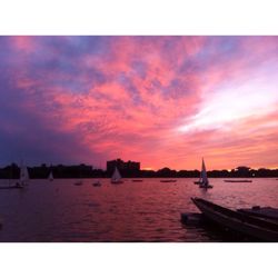 Scenic view of river at sunset