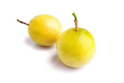 Close-up of fruits against white background