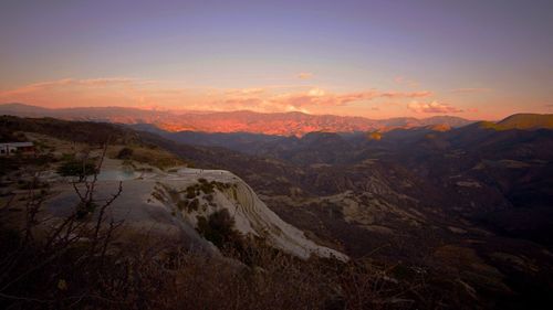 Scenic view of mountains at sunset