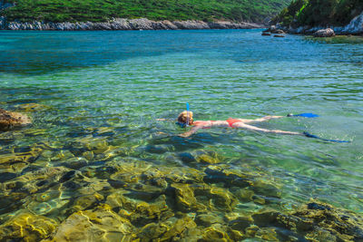 Man swimming in sea