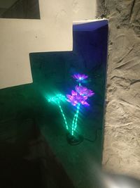 High angle view of illuminated light painting on wall