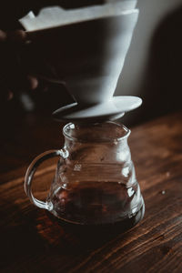 Close-up of coffee cup on table