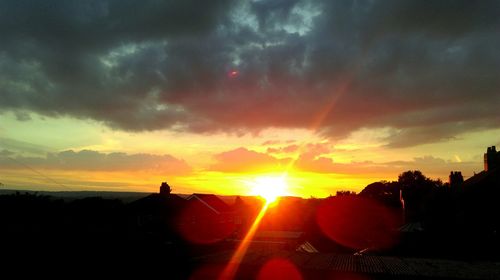 Sun shining through clouds