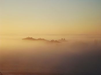Scenic view of sea against sky at sunset