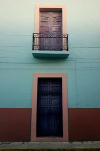 Low angle view of closed door of building