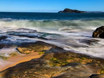 Scenic view of sea against clear sky