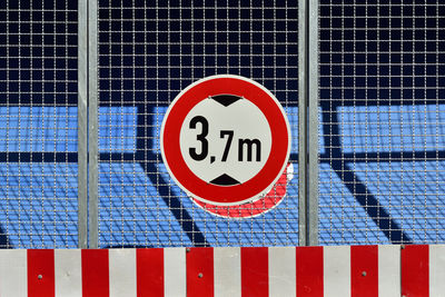 Information sign on fence
