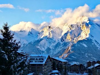 Scenic view of snowcapped mountains against sky