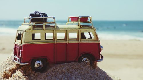 Toy car on the beach