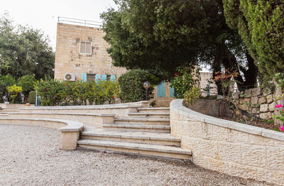 Staircase by building in city