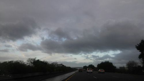 Road against cloudy sky