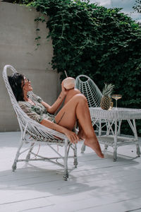 Woman sitting on chair