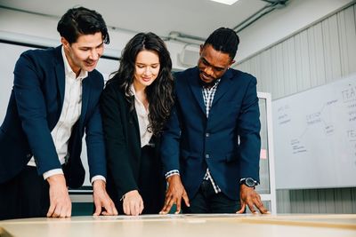 Business colleagues working in office