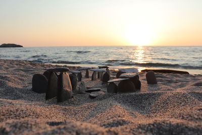 Scenic view of sea against sky during sunset