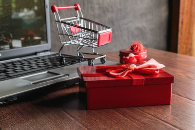 Close-up of red box on table