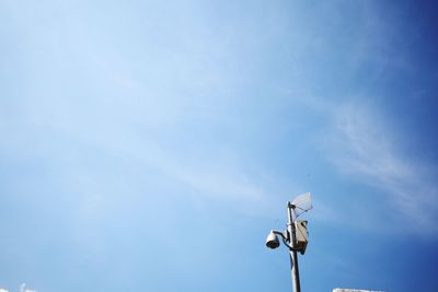 Low angle view of street light against sky