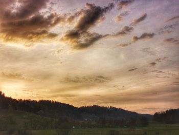 Scenic view of dramatic sky during sunset