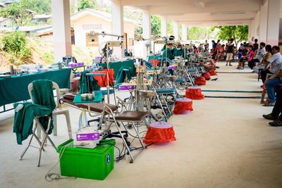 Close-up of chairs on table