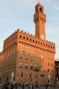 Low angle view of palazzo vecchio against sky