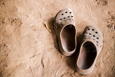 High angle view of shoes on floor